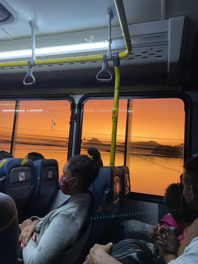 A photo taken inside the bus passing by the Araçatiba lagoon in Maricá, Brazil